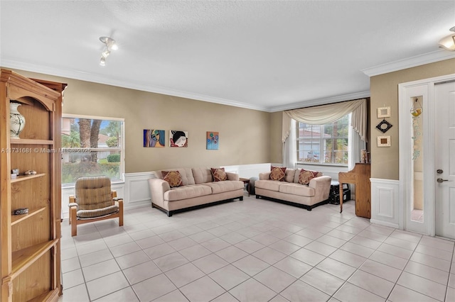 tiled living room with ornamental molding