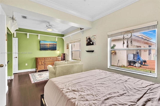 bedroom with crown molding, ceiling fan, and hardwood / wood-style floors