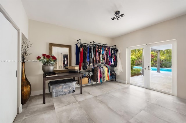 walk in closet with french doors