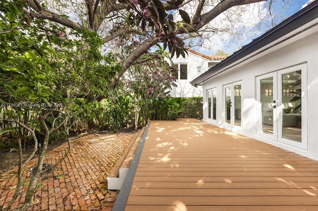 wooden deck with french doors