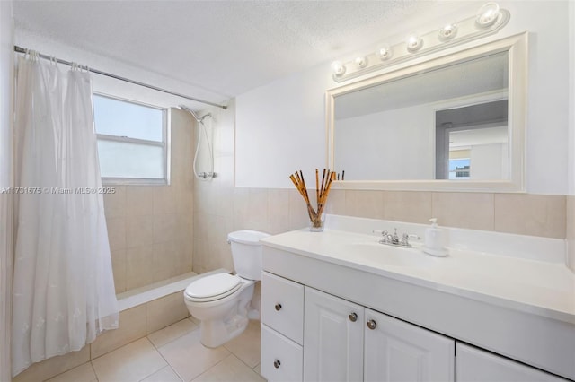 bathroom with backsplash, vanity, toilet, a textured ceiling, and a shower with curtain