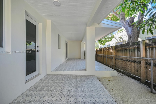 view of patio / terrace with fence