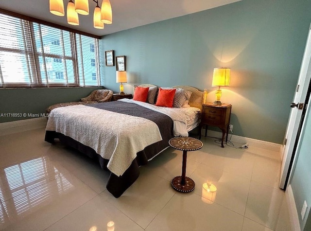 2030 S Ocean Dr Unit 506, Hallandale Beach, FL 33009 - bedroom featuring a chandelier and tile patterned floors