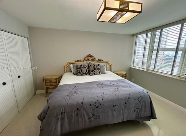 2030 S Ocean Dr Unit 506, Hallandale Beach, FL 33009 - bedroom with multiple windows, a closet, and light carpet