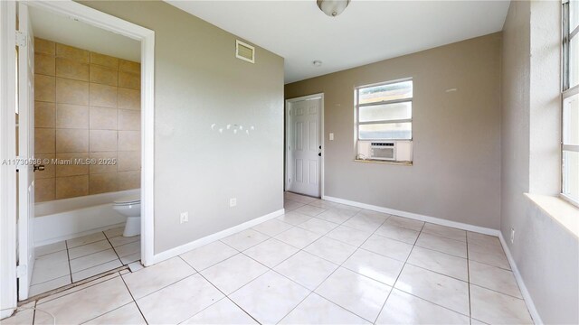 full bathroom featuring vanity, toilet, and tiled shower / bath