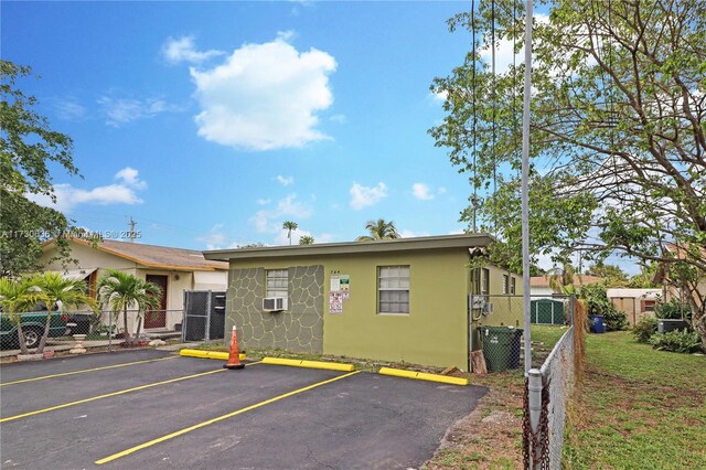 back of house featuring a yard