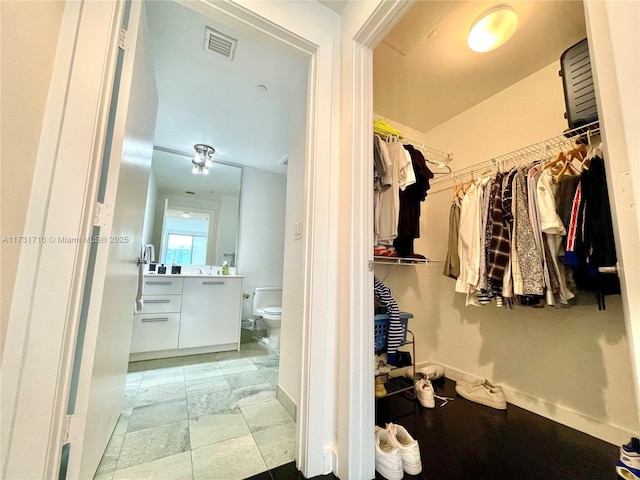 view of walk in closet