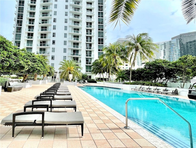 view of pool featuring a patio