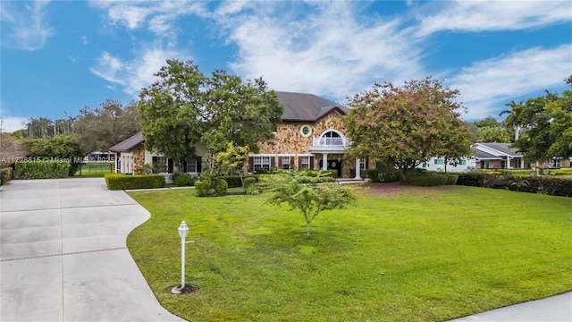 view of front of home with a front lawn