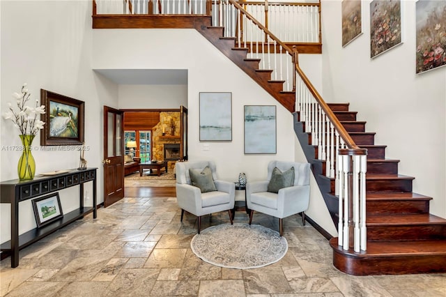 stairway with a towering ceiling