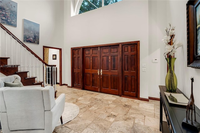 entrance foyer with a towering ceiling