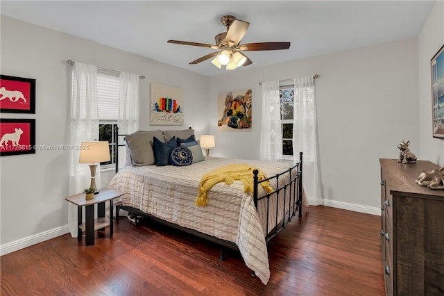 bedroom featuring dark wood-type flooring and ceiling fan