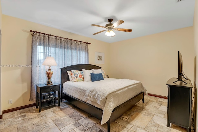 bedroom featuring ceiling fan