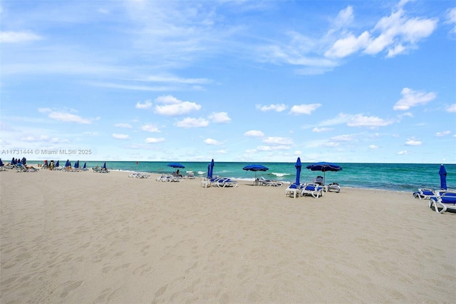 property view of water featuring a view of the beach