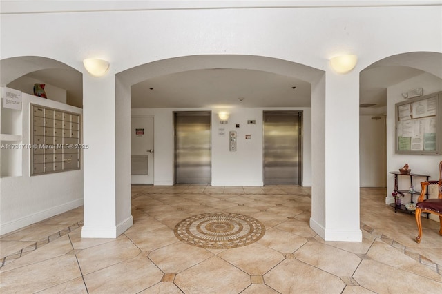 interior space featuring a patio and elevator