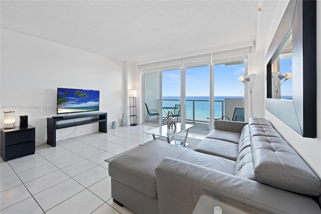 tiled living room with a textured ceiling