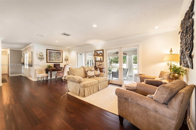 living room with ornamental molding, dark hardwood / wood-style floors, and french doors