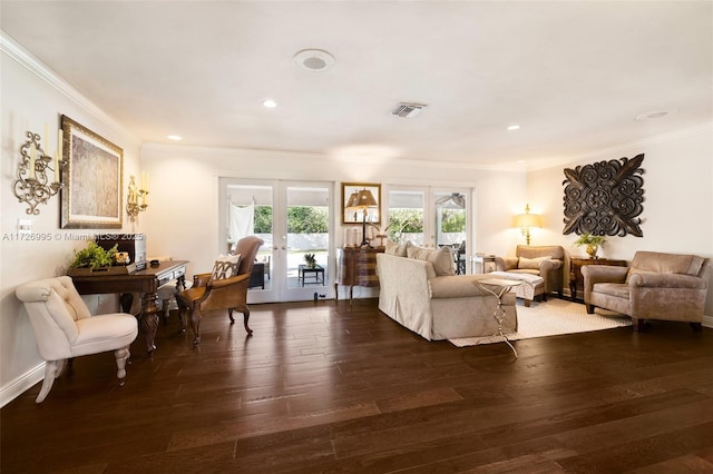 living room with dark hardwood / wood-style flooring, ornamental molding, french doors, and a healthy amount of sunlight