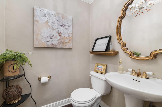 bathroom with toilet and sink