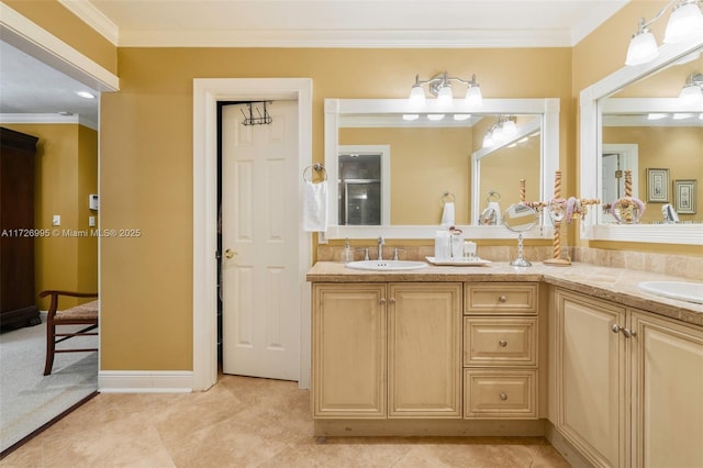 bathroom with vanity, crown molding, and tile patterned floors