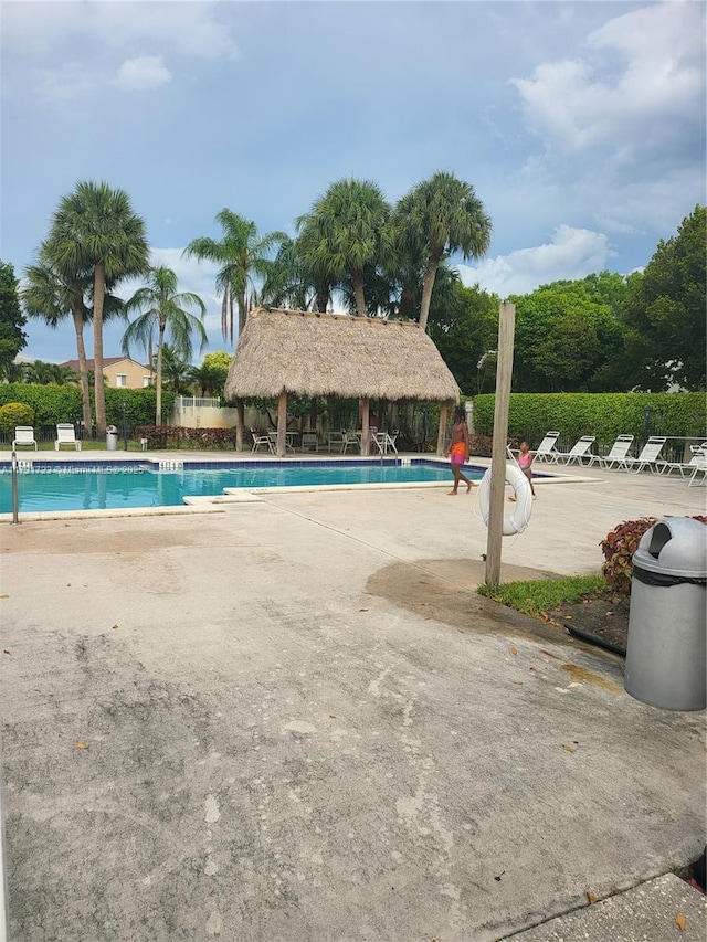 view of swimming pool featuring a patio area