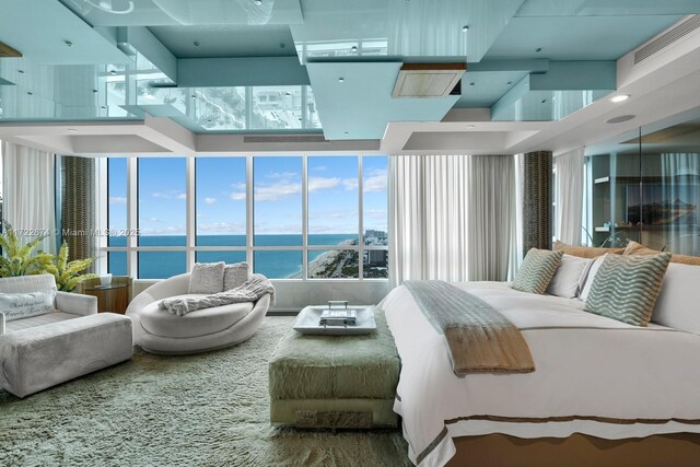 bedroom featuring a water view