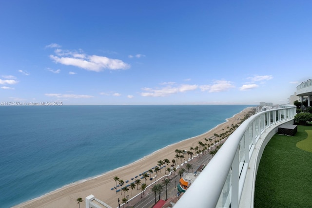 view of water feature with a beach view