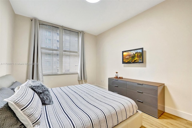 bedroom featuring light wood-type flooring