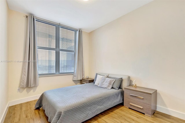 bedroom featuring light wood-type flooring