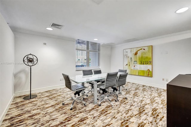 dining area with ornamental molding