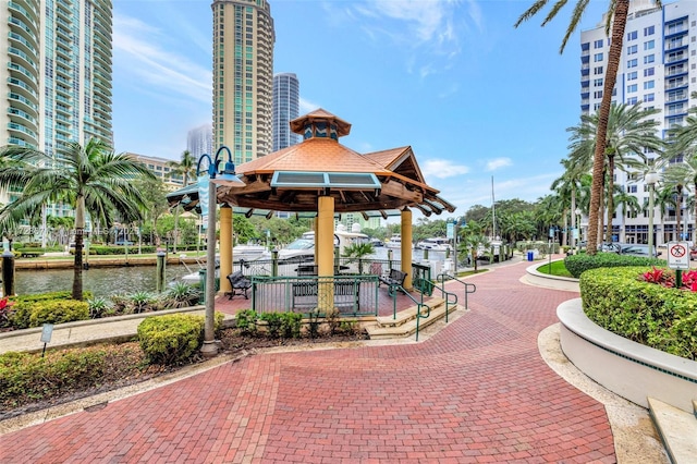 view of property's community featuring a water view and a gazebo