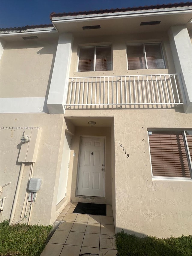 doorway to property with a balcony