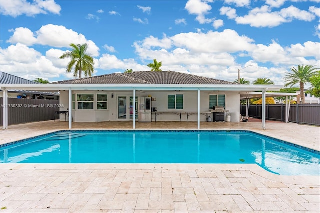 view of pool with a patio area