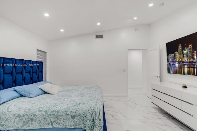 bedroom with lofted ceiling