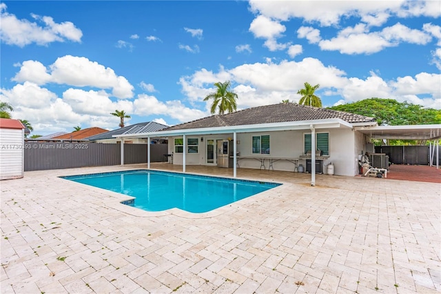 view of pool featuring a patio area