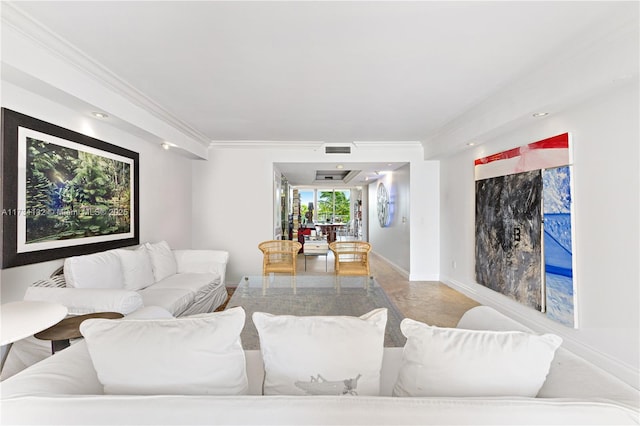 living room featuring crown molding