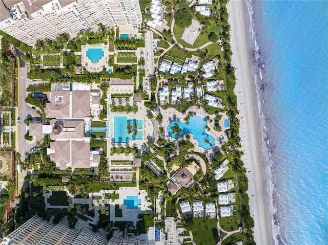 aerial view featuring a water view and a view of the beach