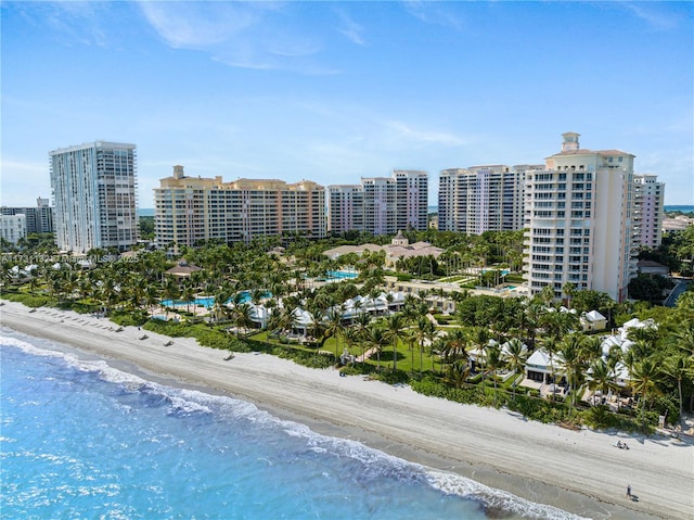 aerial view featuring a view of the beach and a water view