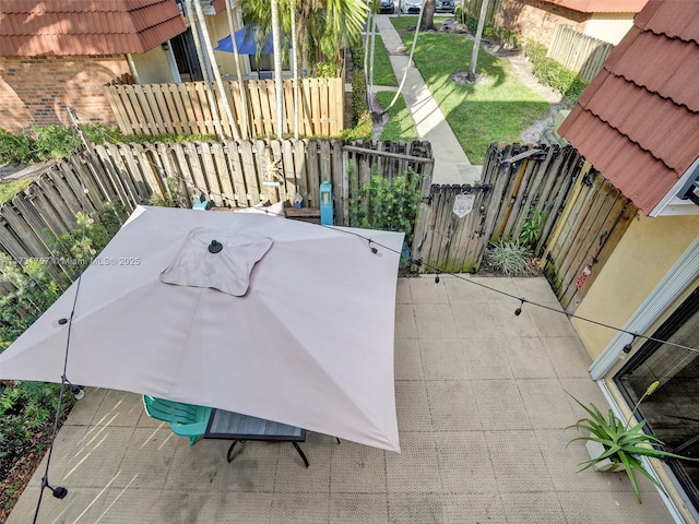 view of patio with a grill