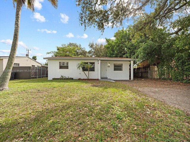 view of front of house with a front lawn