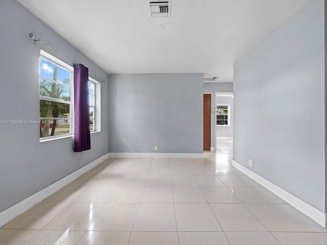 view of tiled spare room