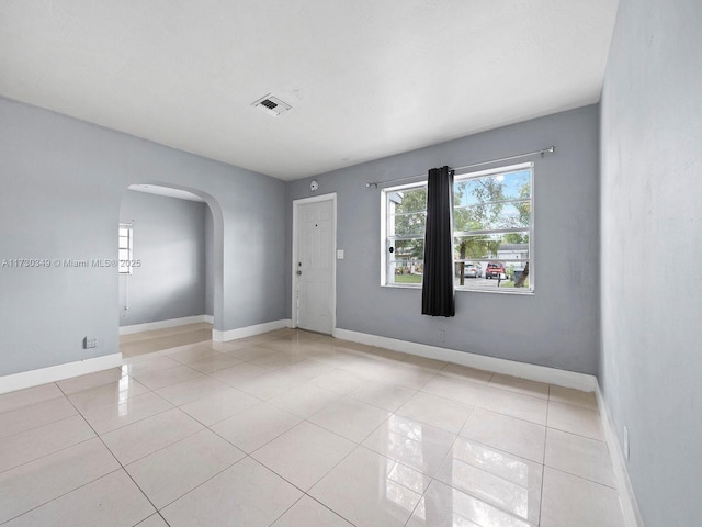 view of tiled spare room