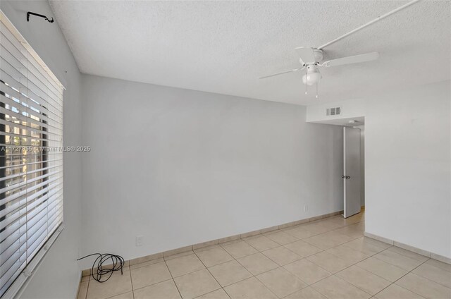 interior space with hardwood / wood-style flooring and a textured ceiling