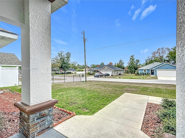 view of yard featuring a garage