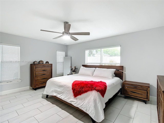 bedroom featuring ceiling fan