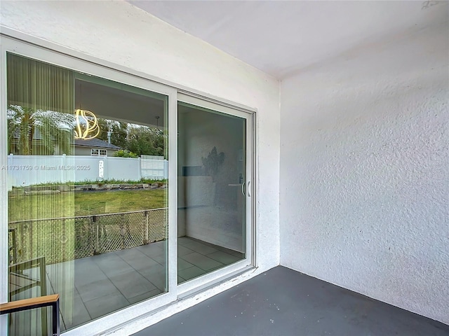 property entrance featuring a balcony