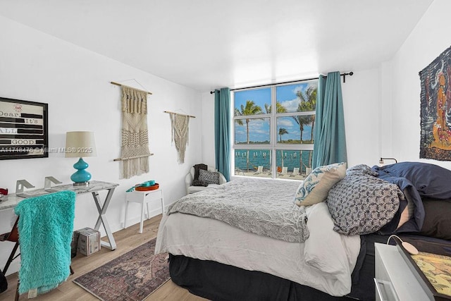 bedroom featuring light wood-type flooring