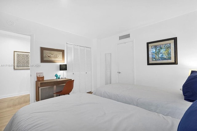 bedroom featuring hardwood / wood-style floors