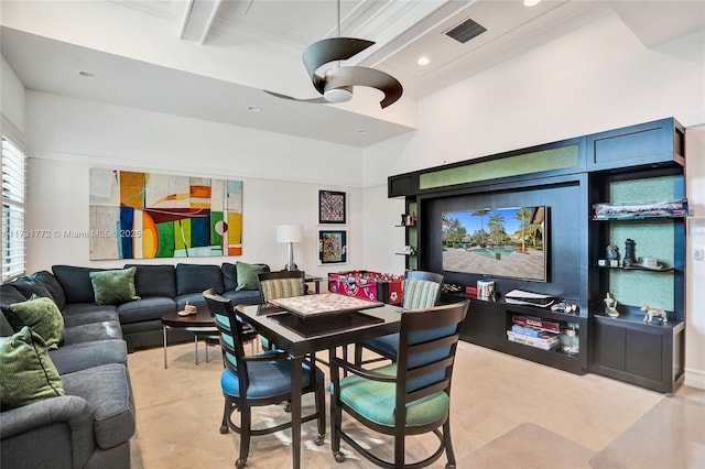 carpeted dining space with a high ceiling