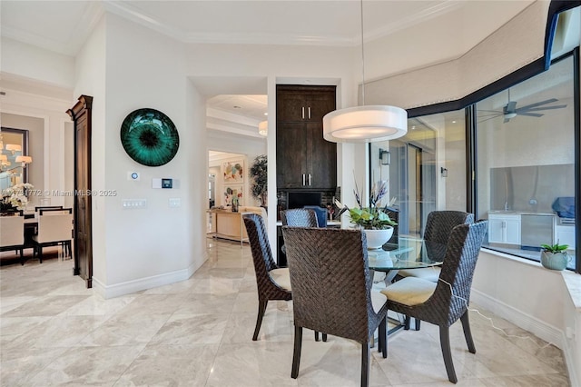 dining area with crown molding